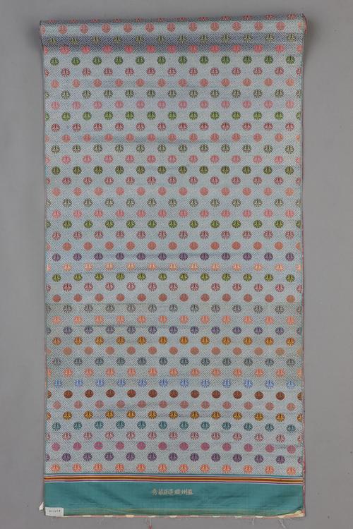 豆青色地万寿纹织金锦