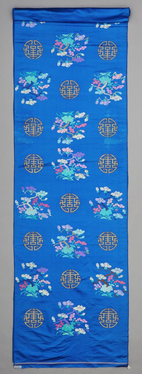 蓝色海棠玉兰团寿纹妆花缎