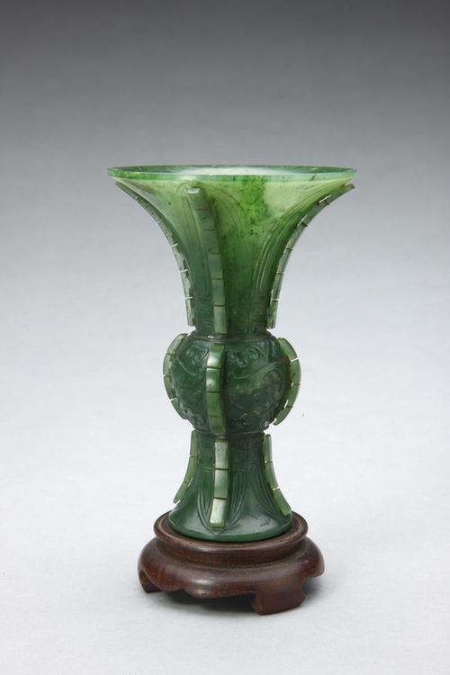 碧玉透雕荷包式带提梁花熏