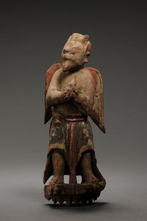 木雕彩绘人身兽首立像