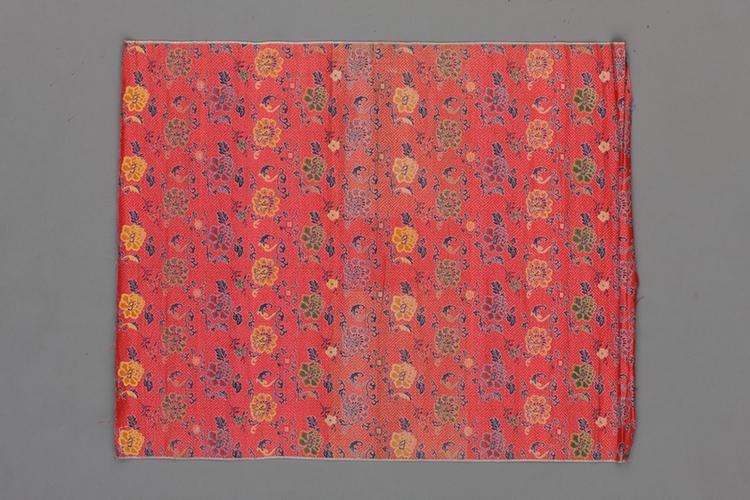 桃红色万字地折枝牡丹纹锦