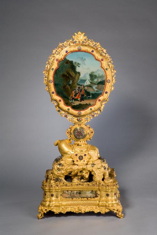 铜镀金嵌玻璃花转人象驮镜表