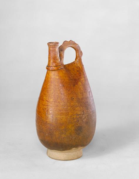 黄釉划花提梁壶