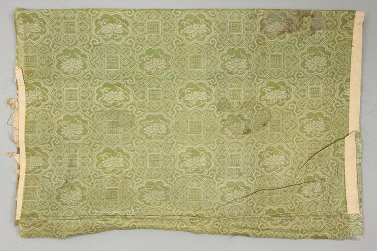 绿色地万字缠枝莲纹锦