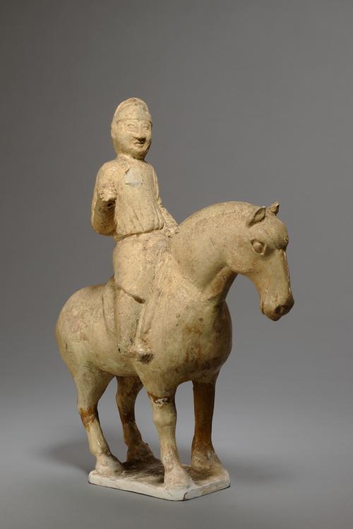 陶黄釉骑马男俑