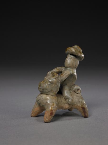 石湾窑灰釉骑兽人像