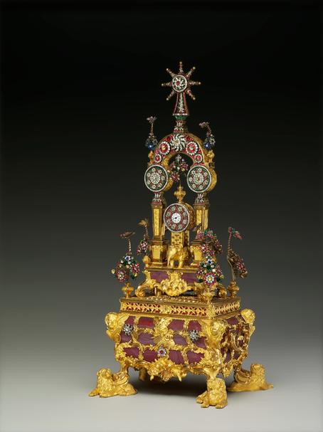 铜镀金镶玛瑙乐箱牌楼式象驮转花钟