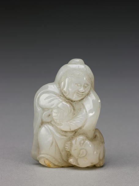 白玉浮雕狮球坐人