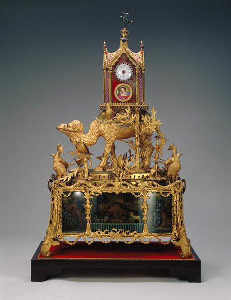 铜镀金转人水法活动蝶鸟骆驮钟