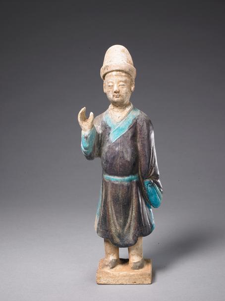 陶紫绿釉男立俑