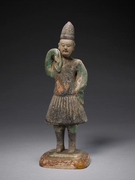 陶孔雀绿加紫釉轿夫俑