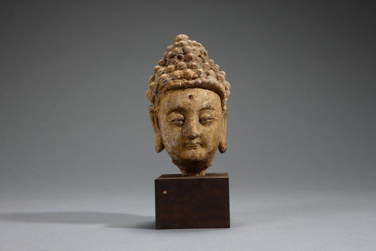 泥塑加金佛像头