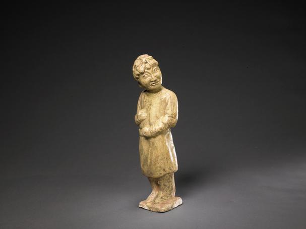 陶黄釉胡人立俑