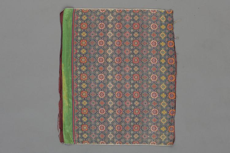 绿色地四合如意纹锦