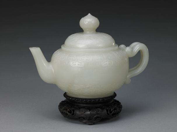 白玉勾云纹双连柄执壶