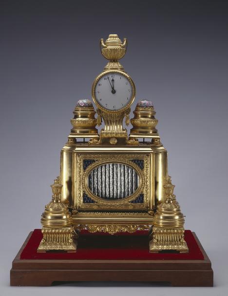 铜镀金缺角乐箱转水法转花钟