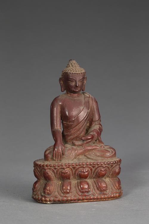 木雕紫漆佛坐像