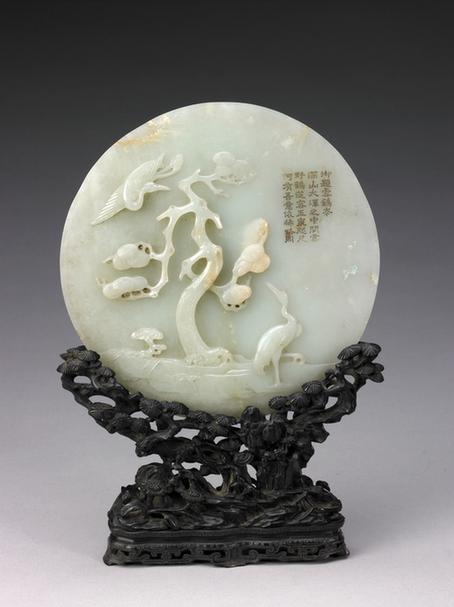 青玉双面雕松鹤图圆插屏