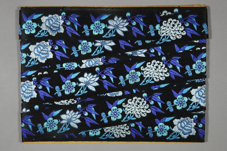 元青色缎地三蓝梅兰竹菊纹绦