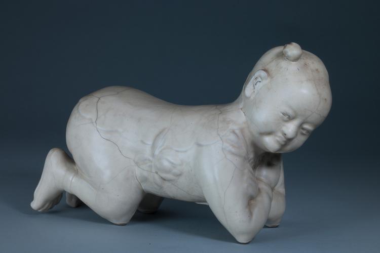 磁州窑白釉孩儿枕