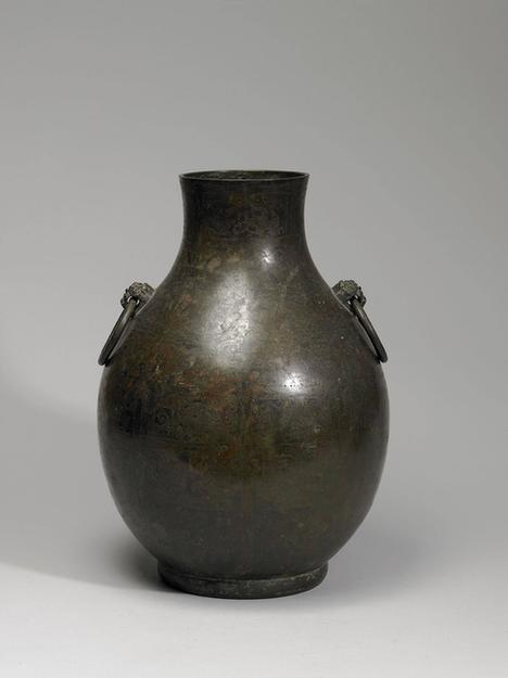 战国 嵌异金属鸟兽纹壶