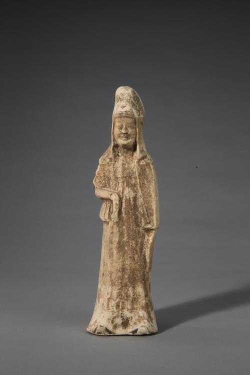 陶黄釉披风衣女立俑