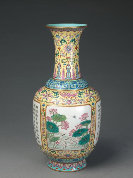 乾隆款黄地粉彩开光花卉诗句撇口瓶