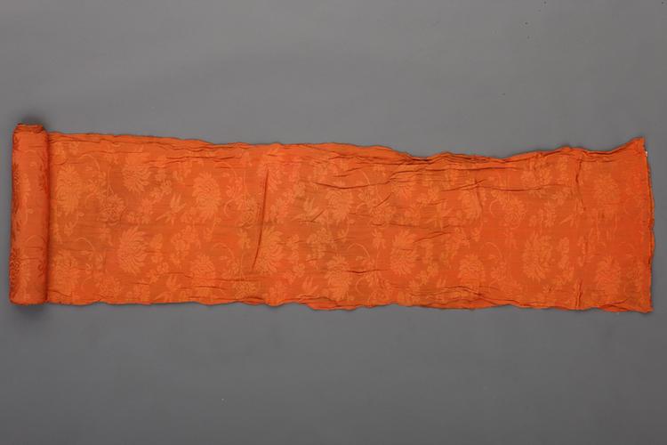 杏黄色梅兰竹菊纹绉绸