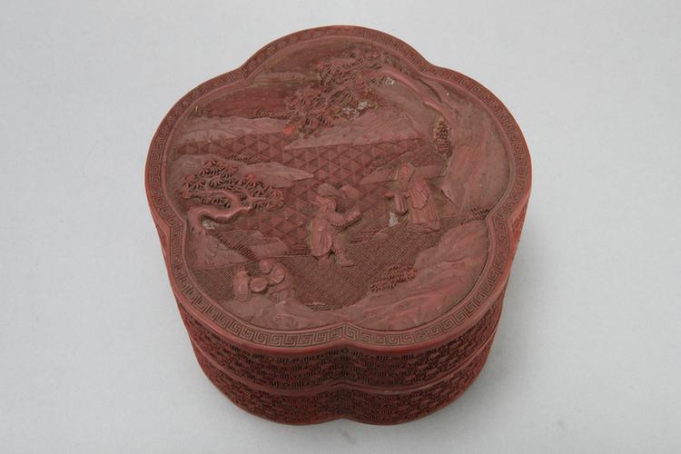 剔红山水人物图开光花卉纹梅花式盒