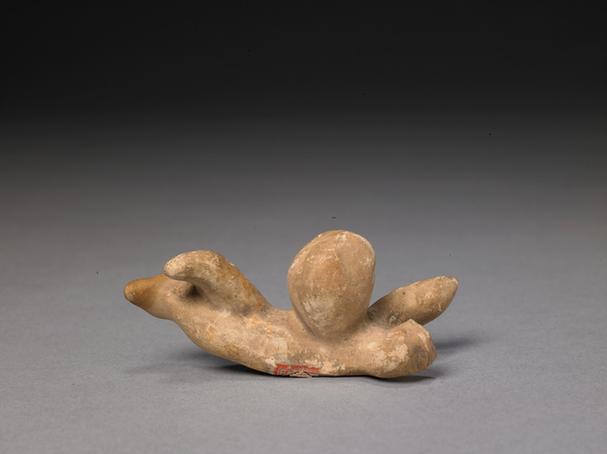 石湾窑黄釉卧人像