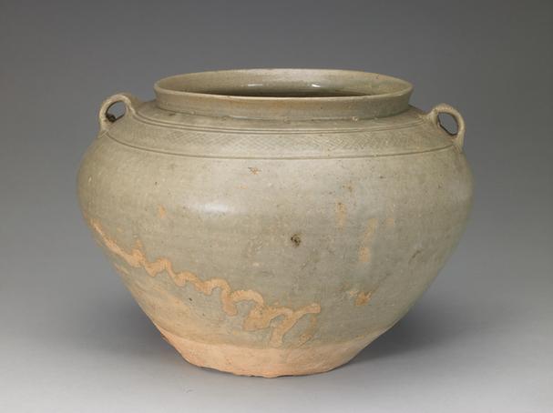 青釉印网格纹双系罐