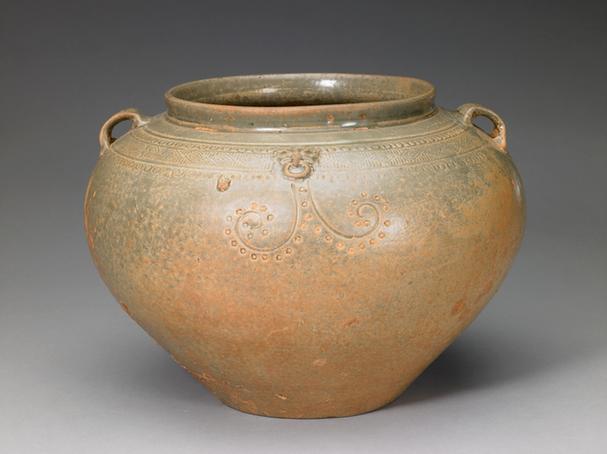 青釉刻花双系罐