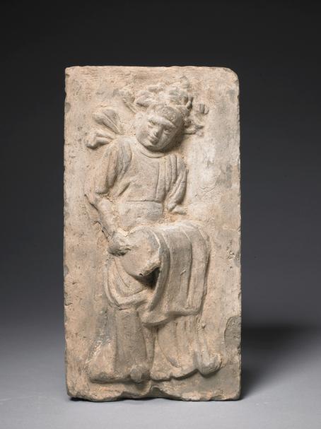 杖鼓伎乐人物砖雕