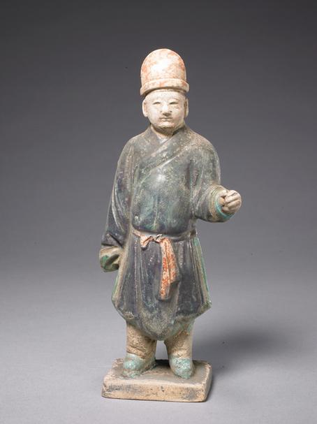 陶紫绿釉男立俑