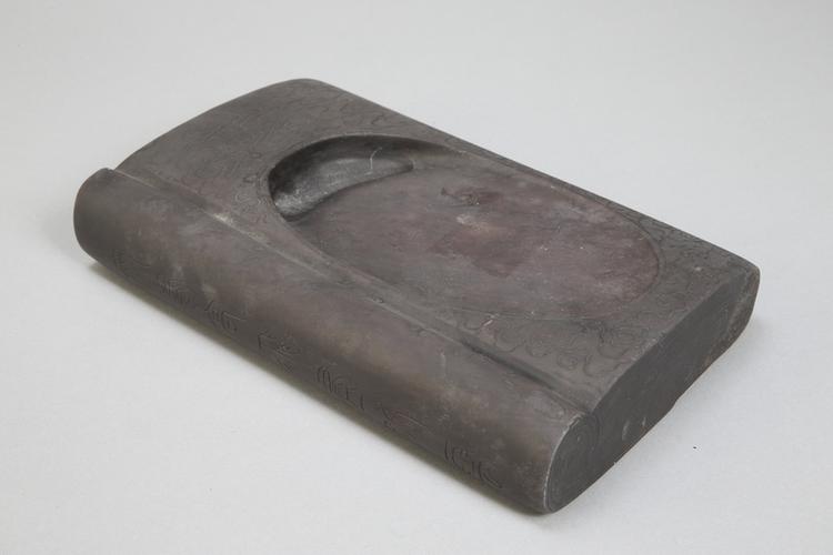 端石雕云纹卷书式砚